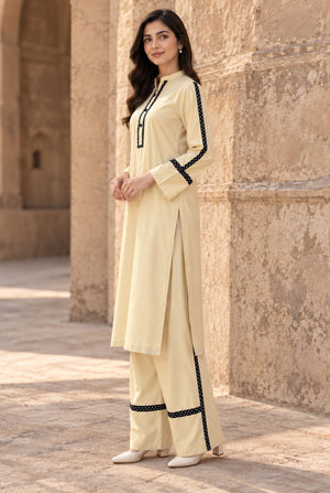 Model wearing off-white linen dress design 2PC, back view of the stitched dyed linen dress, available at Buraqstore