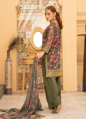 Women wearing green dress design, close-up of the gotta patti and tassel detailing on the silk shirt, Buraqstore