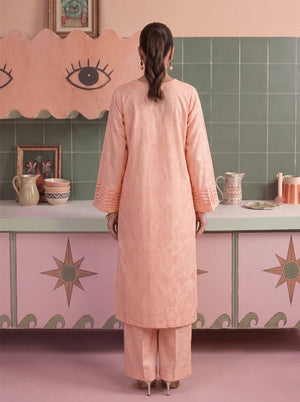 Women wearing peach color dress, back view of the stitched cambric shirt and matching trouser, Buraqstore