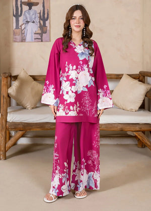 A girl dressed in pink co ord set for girls, printed 2-piece poly lawn set, front view from Buraqstore