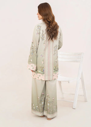 Women wearing green dress design, close-up of the print on the poly lawn shirt, Buraqstore