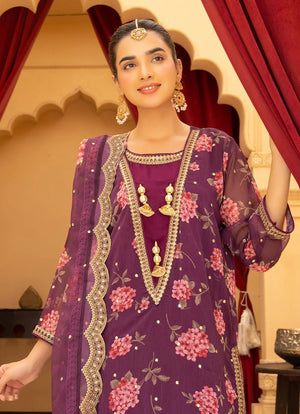 Women wearing purple dress design, dupatta with tassel accents draped over the shoulder, Buraqstore