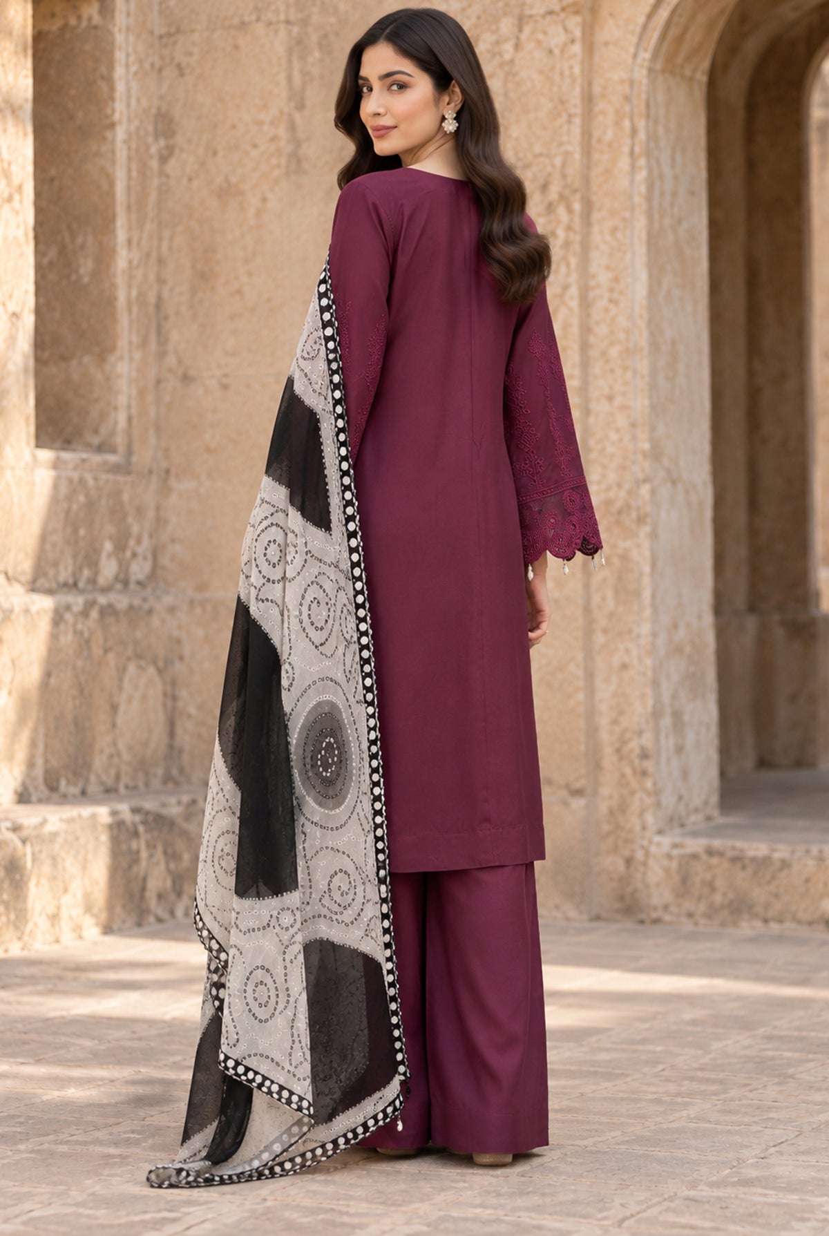 Women wearing plum chicken kari dress price in pakistan set, close-up of the chikankari embroidery on the viscose shirt, Buraqstore