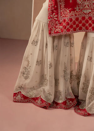 Model wearing red colour dress pakistani as a festive outfit, shop the embroidered silk 3-piece set at Buraqstore