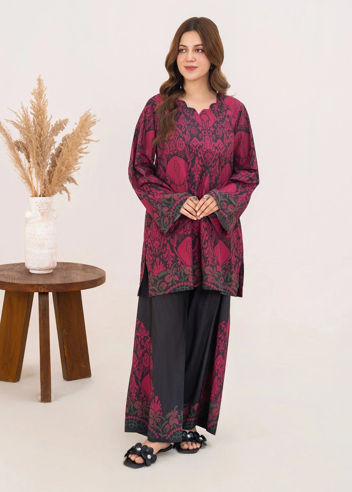 Model wearing red combination dress in blood red and black, printed poly lawn 2PC set, front view from Buraqstore