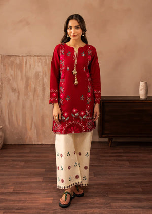 Model wearing red colour dress finished in white, embroidered lawn 2PC set, front view from Buraqstore