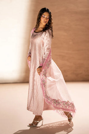 Model wearing rose pink sheesha silk price in pakistan set with matching trouser, side view of the 3PC at Buraqstore