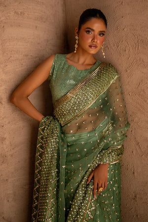 Women wearing sage green saree online pakistan as a party look, shop organza saree at Buraqstore