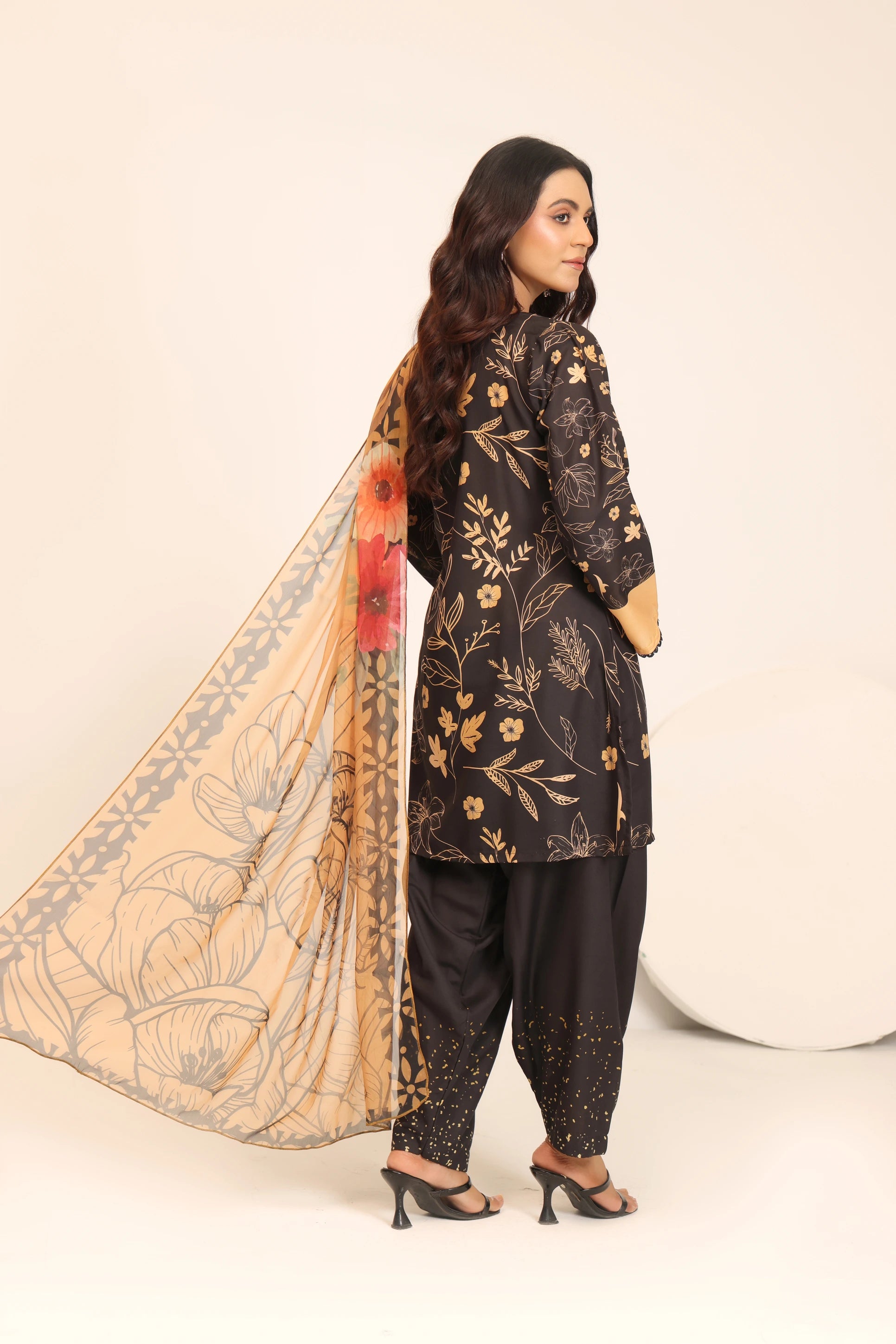 girl posing in simple black dress design buraqstore with elegant 3PC styling