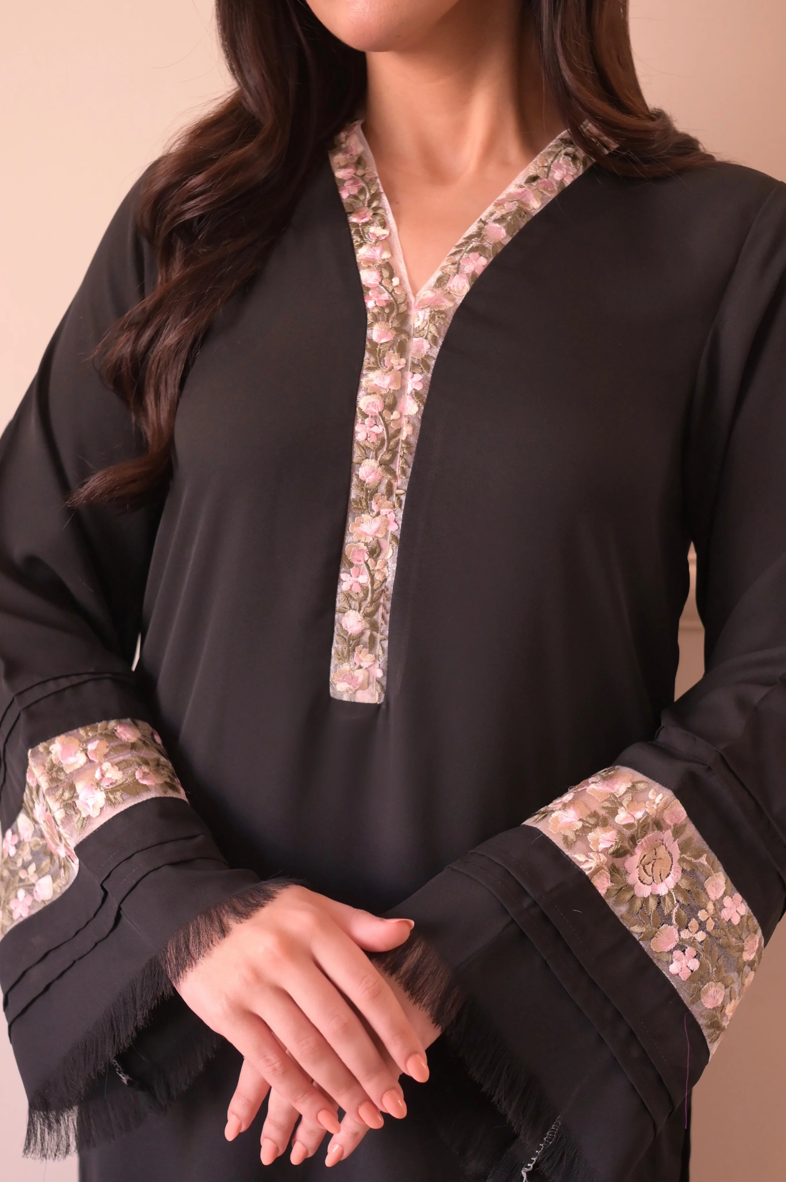 woman posing in Buraqstore two piece pret set with black dress design for girls and elegant shape