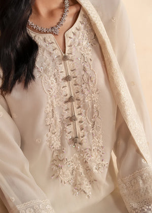Women wearing white dress design, chiffon dupatta draped over the shoulder, Buraqstore