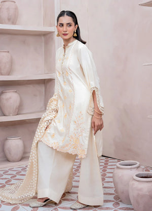 Women wearing white dress for women, close-up of the embroidery on the raw silk shirt, Buraqstore