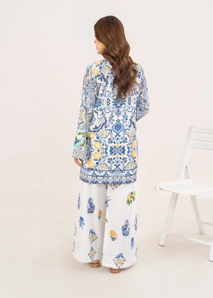 Women wearing white co ord set design in a relaxed standing pose, printed grip 2-piece at Buraqstore