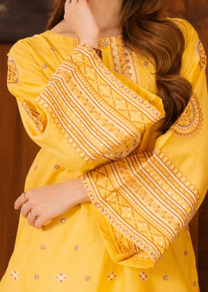 Women wearing yellow dress design, back view of the embroidered shirt and trouser, Buraqstore