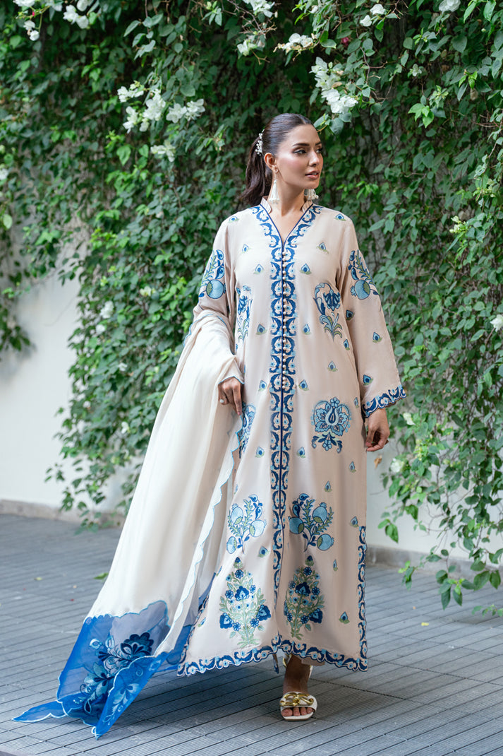 model wearing elegant white suit buraqstore eid white dress designs pakistani