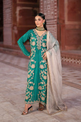 Raw silk dress design by Buraqstore worn by a model in embroidered raw silk pret