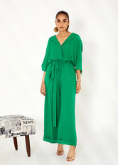 Woman wearing Buraq Store jumpsuit Pakistan glow green outfit