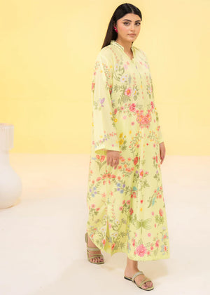 model posing in yellow one piece dress by buraqstore trendy look