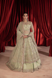 Bride displaying organza farshi lehenga with luxury embroidery by Buraqstore