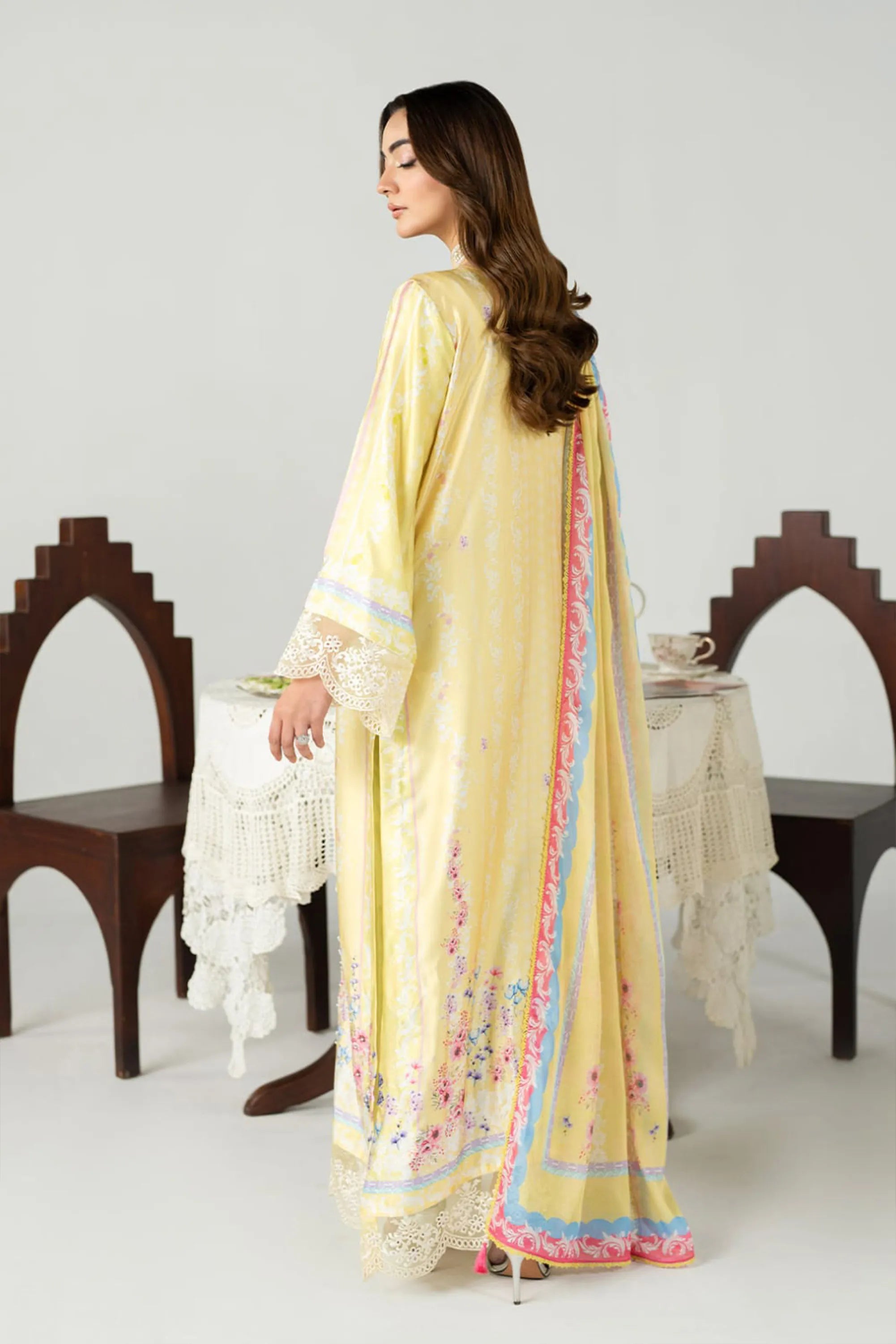 girl posing in light yellow dress by buraqstore fresh look