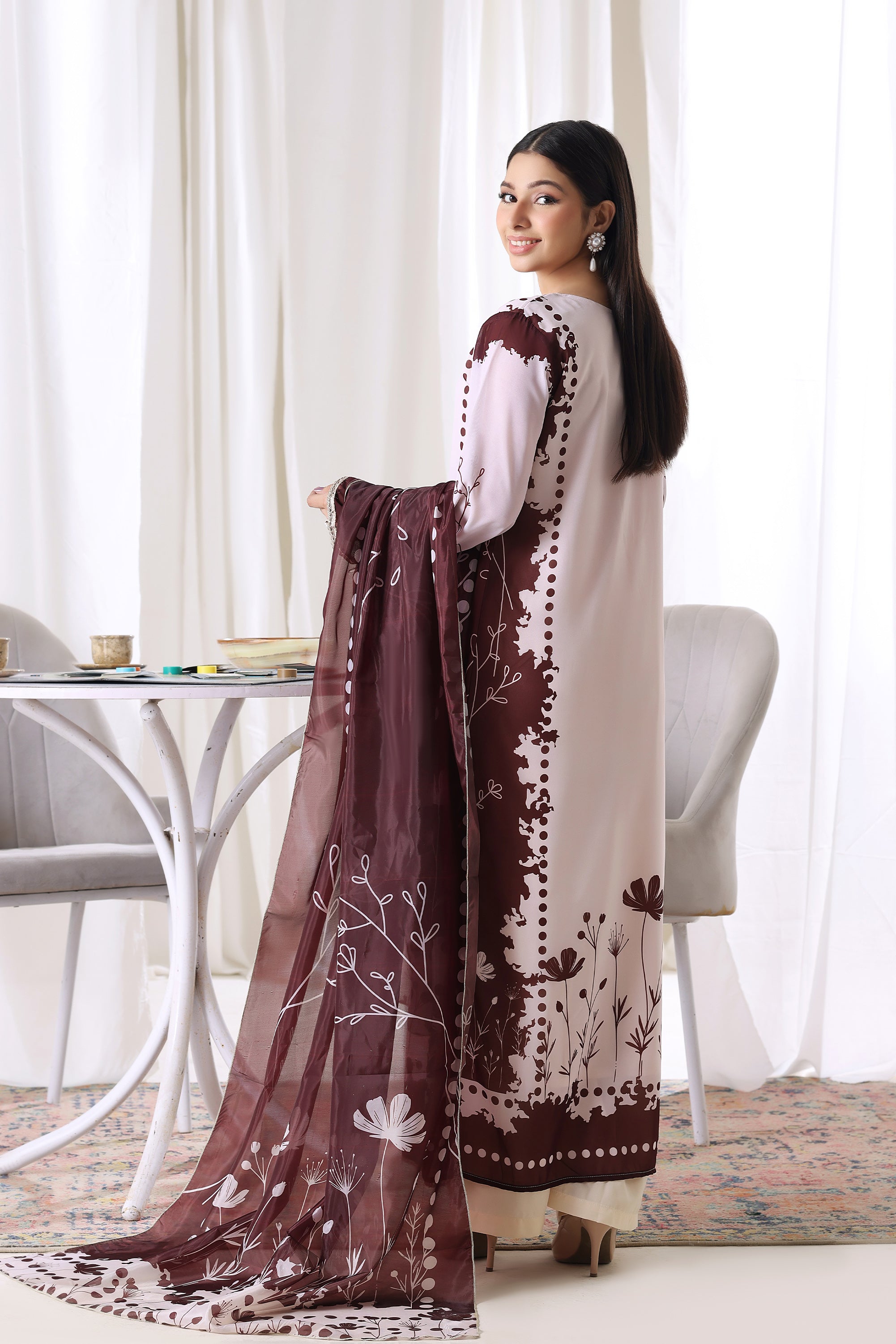 Female model showcasing Blush Burgundy chiffon pret from Buraqstore, trendy ladies dress