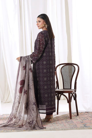 Young woman in Plum Noir chiffon pret from Buraqstore, perfect party dress