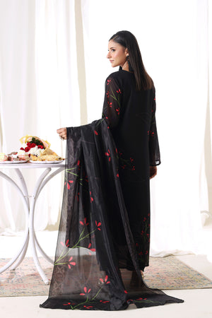 Female model in Midnight Flora chiffon pret from Buraqstore, perfect party dress