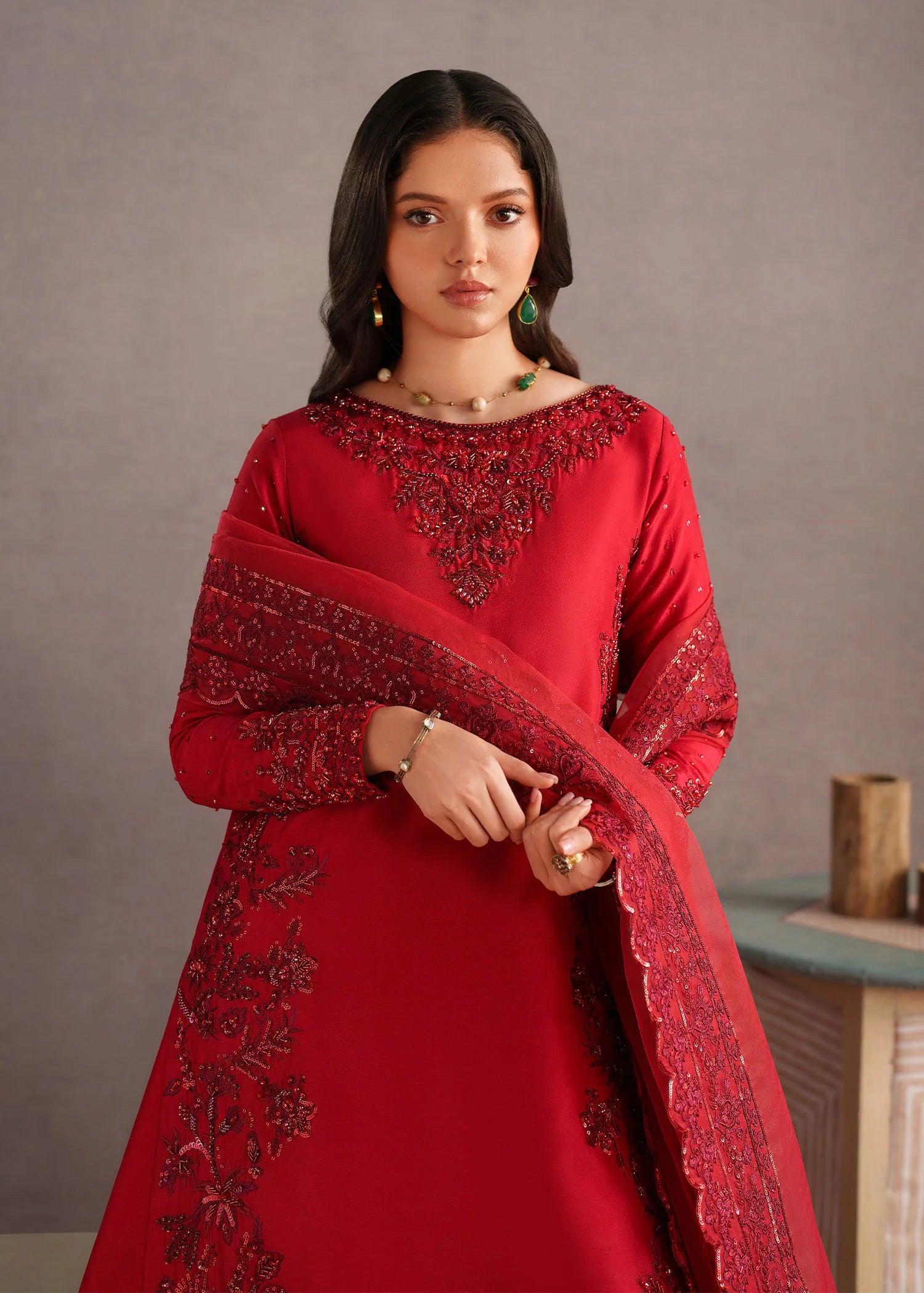 Buraqstore girl posing in soft red colour dress with embroidery details