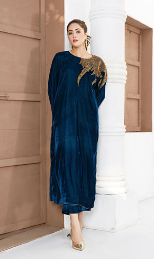 Designer Falak pret velvet suit by BuraqStore featuring elegant embroidery and a modern Pakistani silhouette.