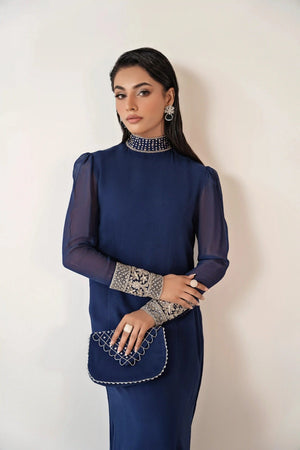 BuraqStore girls party wear maxi dress displaying an embroidered azure outfit with soft fabric drape and festive ready design