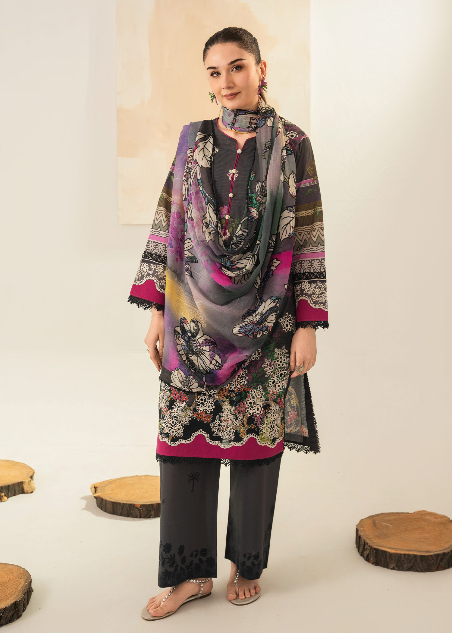 Girl wearing chikankari lawn dress by Buraqstore with cultural styling