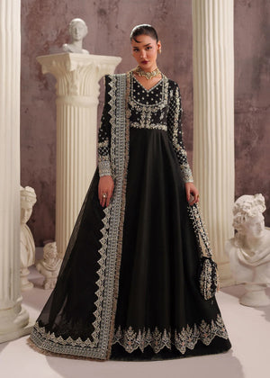Model wearing black lehenga designs in embroidered tissue silk by Buraqstore