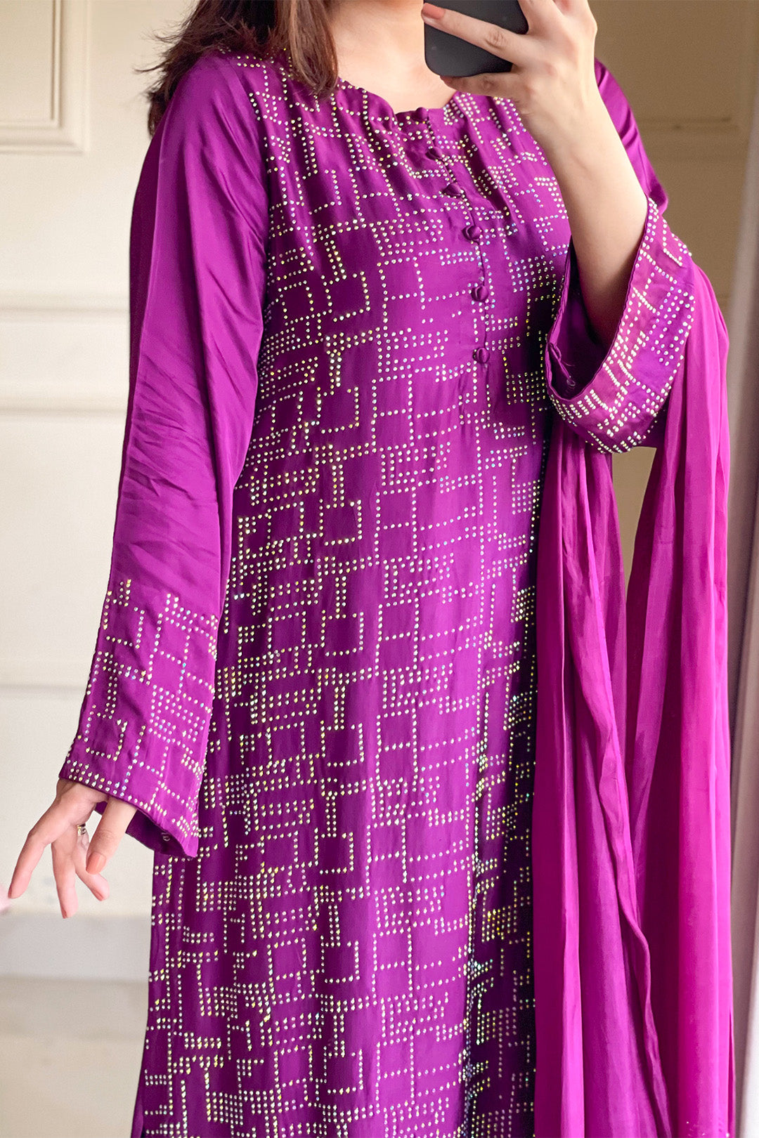 Woman posing in a deep plum 3 piece suit from Sidra Fahad official, featured at Buraq Store