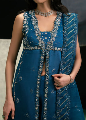 Woman posing in a stylish deep teal Azzure 3 piece outfit from the Dastoor collection PK, featured at Buraq Store