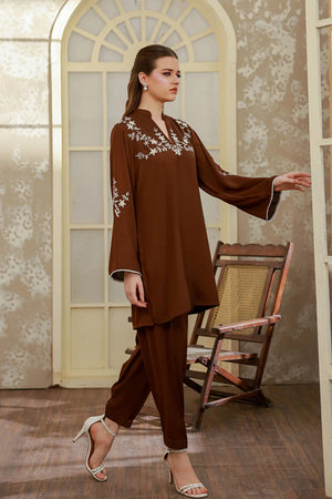 Girl wearing soft georgette dress by Buraqstore styled for evening wear