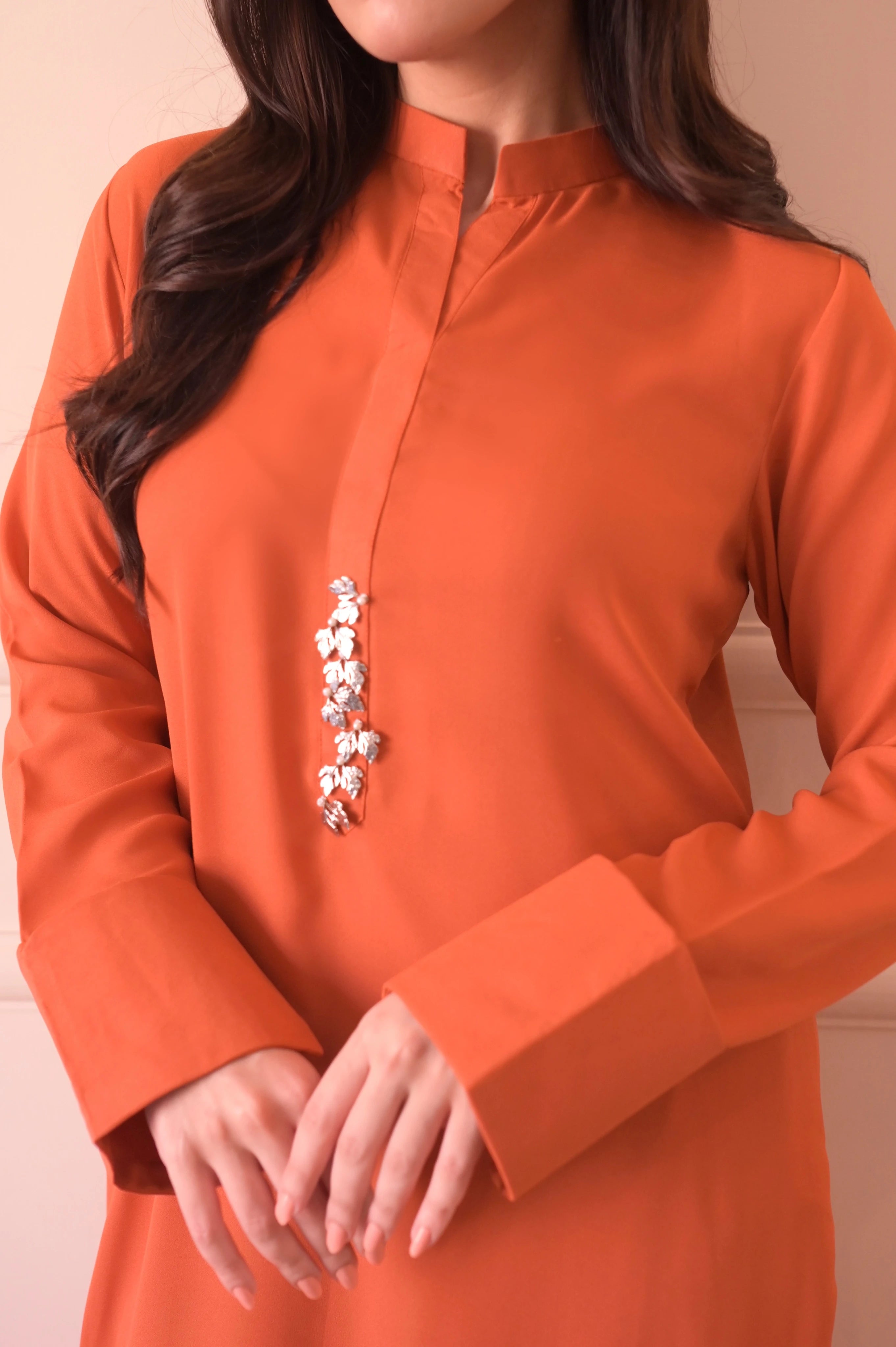 Girl wearing trendy orange dress for girls by buraqstore with minimal look
