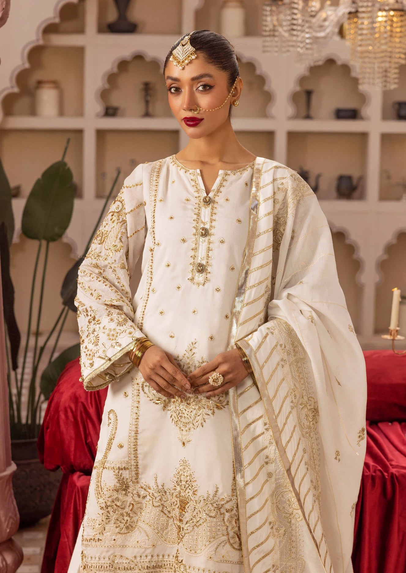 woman posing in white dress pakistani 4 piece outfit buraqstore