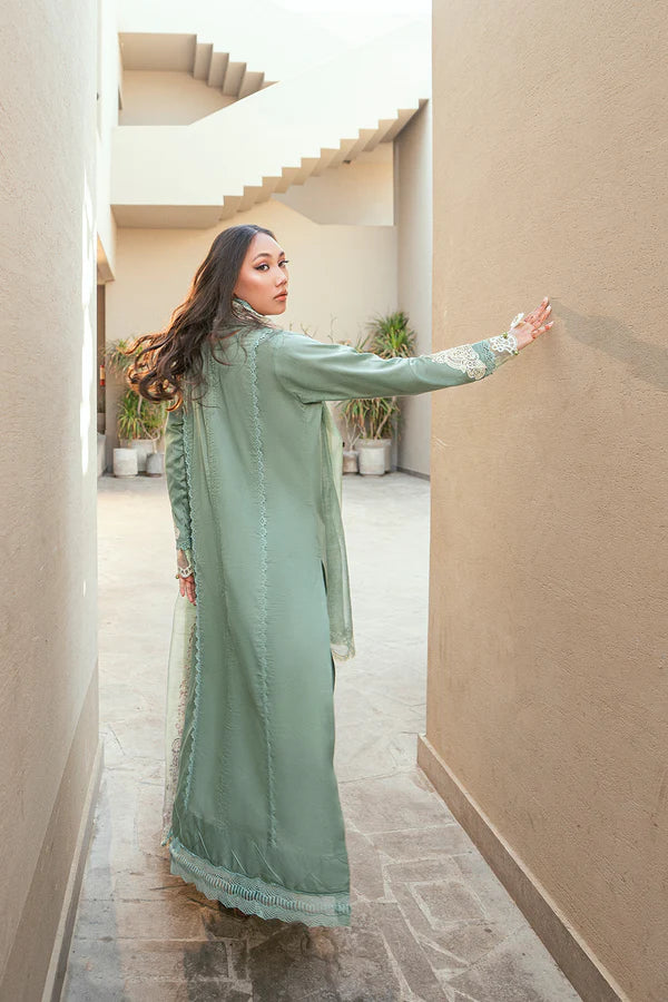 girl posing in embroidered green dress by buraqstore traditional style