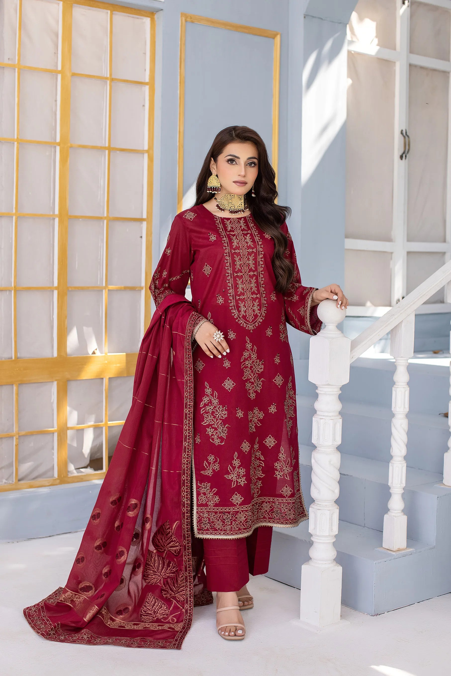 Buraqstore girl posing in floral red colour dress lawn suit with fresh summer styling