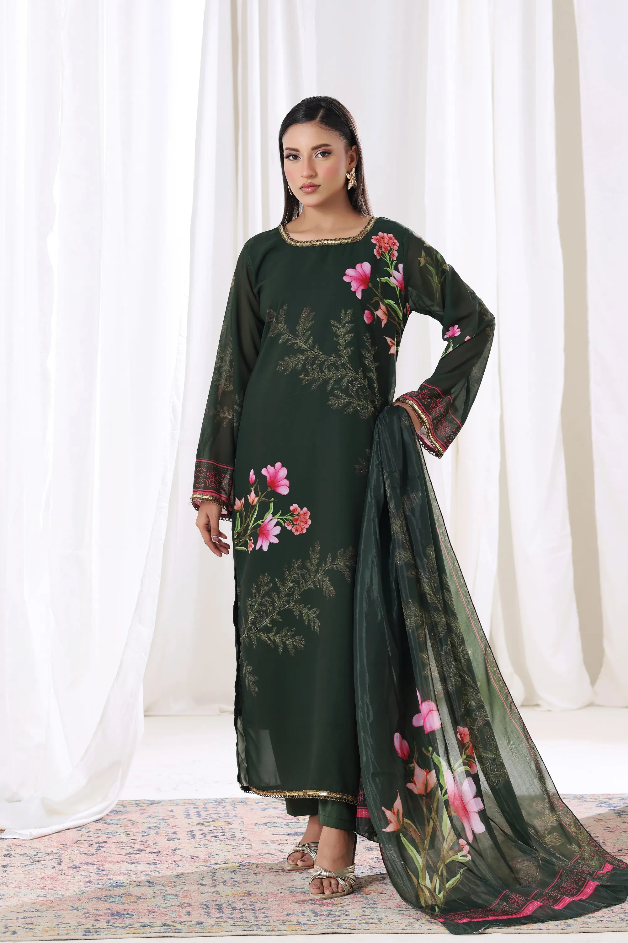 Young woman in Emerald Blossom chiffon pret Buraqstore, perfect party wear for girls