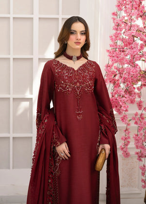 Girl wearing elegant maroon silk suit design by buraqstore Pakistan
