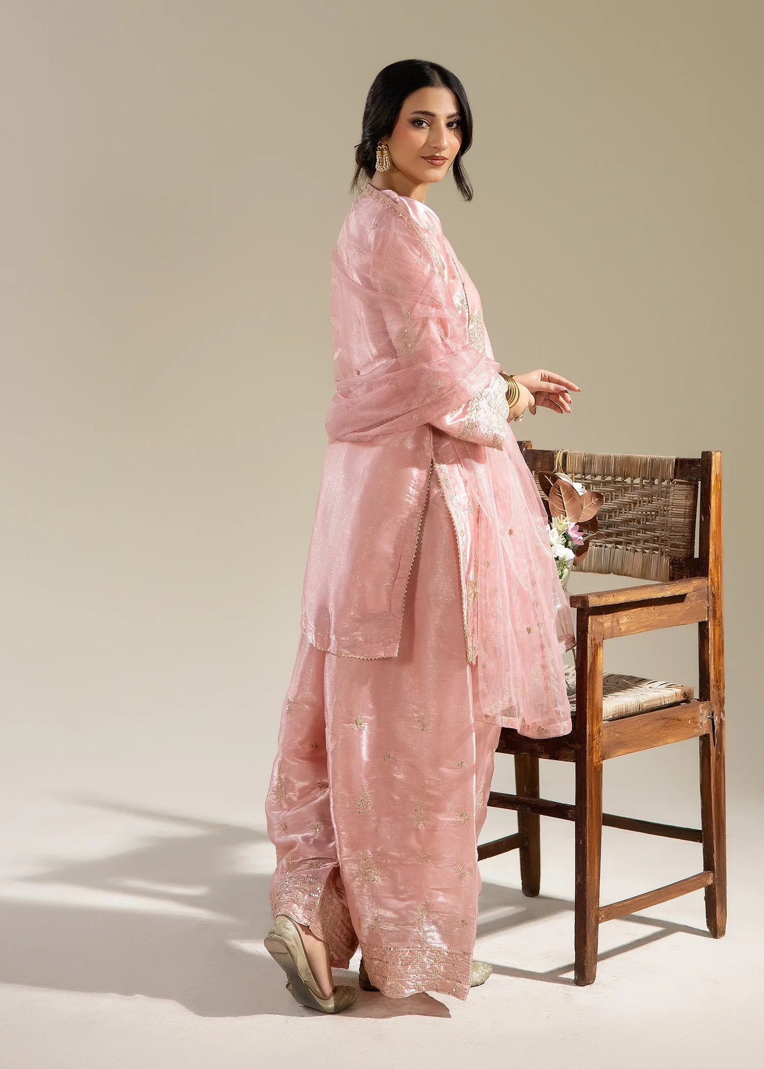woman posing in pink formal suit buraqstore fashion outfit
