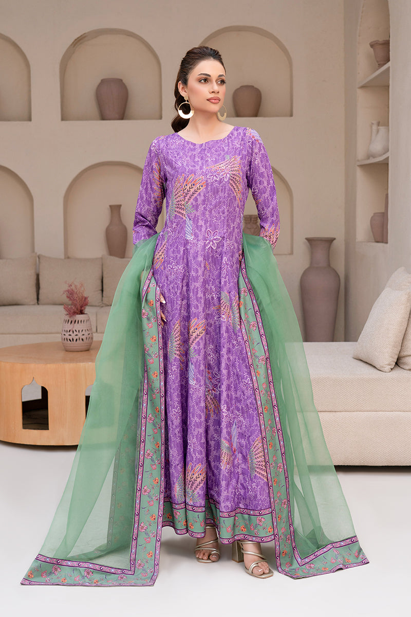 Woman wearing a stylish printed Poly Raw Silk outfit from the Anayra Amal collection, featured at Buraq Store