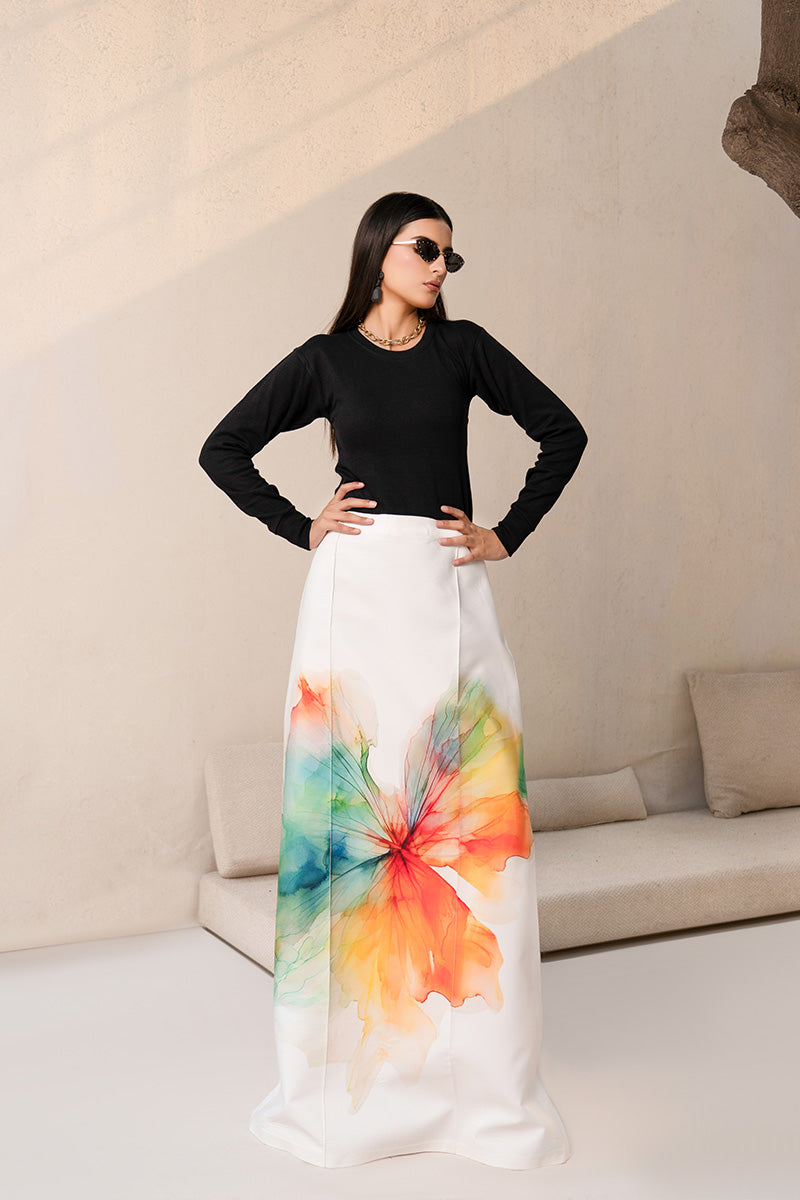 Woman wearing an elegant Anayra Amal dress in Poly Parsley fabric, featured at Buraq Store