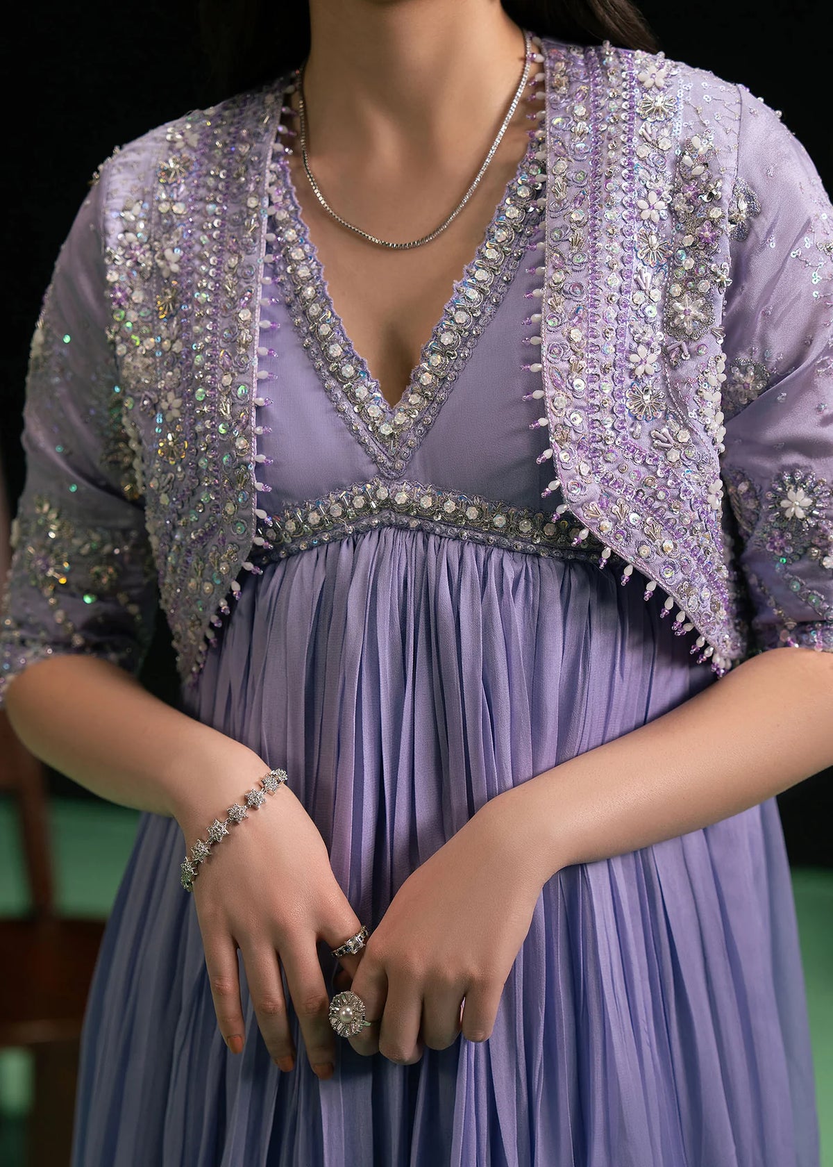 Woman posing in a stylish lilac mist Embrace 3 piece outfit from the Dastoor collection, featured at Buraq Store