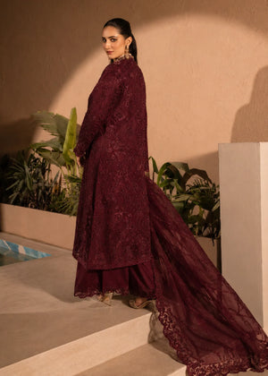 Woman wearing a maroon embellished 4 piece outfit for Manahils dress online shopping, featured at Buraq Store