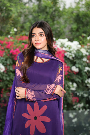 girl posing in purple dress by buraqstore party wear look