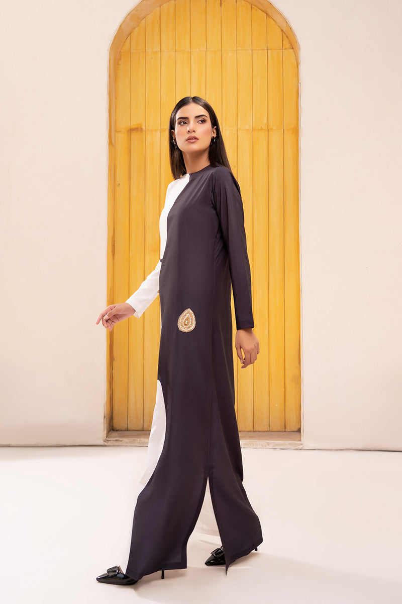 Woman wearing an elegant Anayra Amal dress in printed Poly Raw Silk, featured at Buraq Store