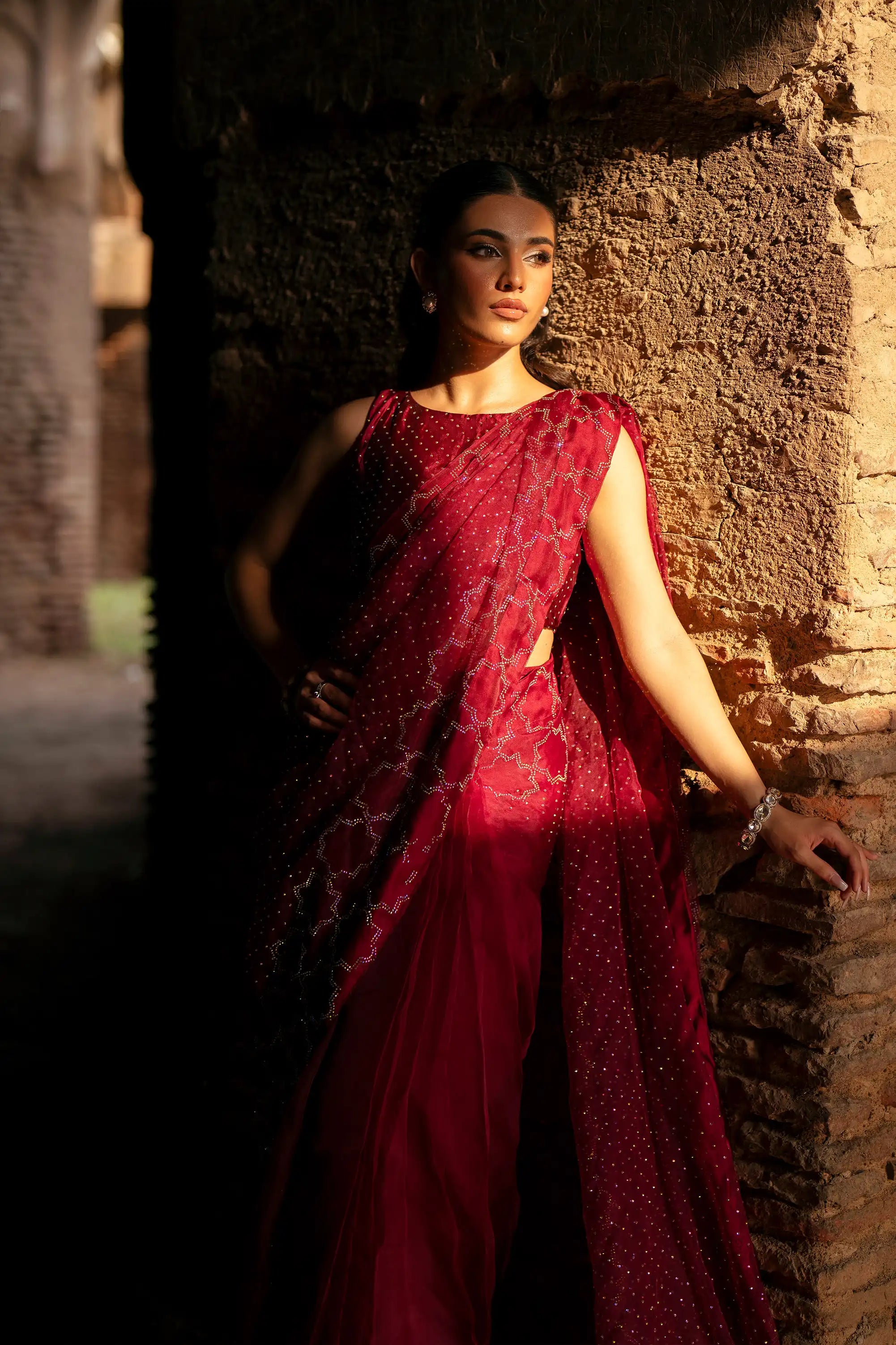 Girl wearing elegant maroon saree dress by buraqstore Pakistan