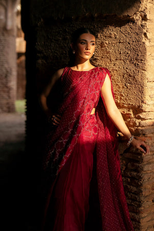 Girl wearing elegant maroon saree dress by buraqstore Pakistan